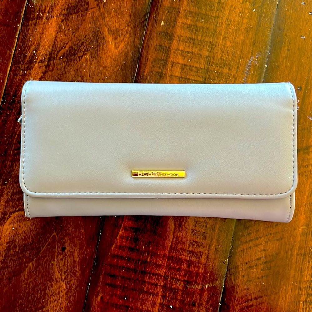 NWOT BCBGeneration wallet. Gray with gold hardware 13 pockets
